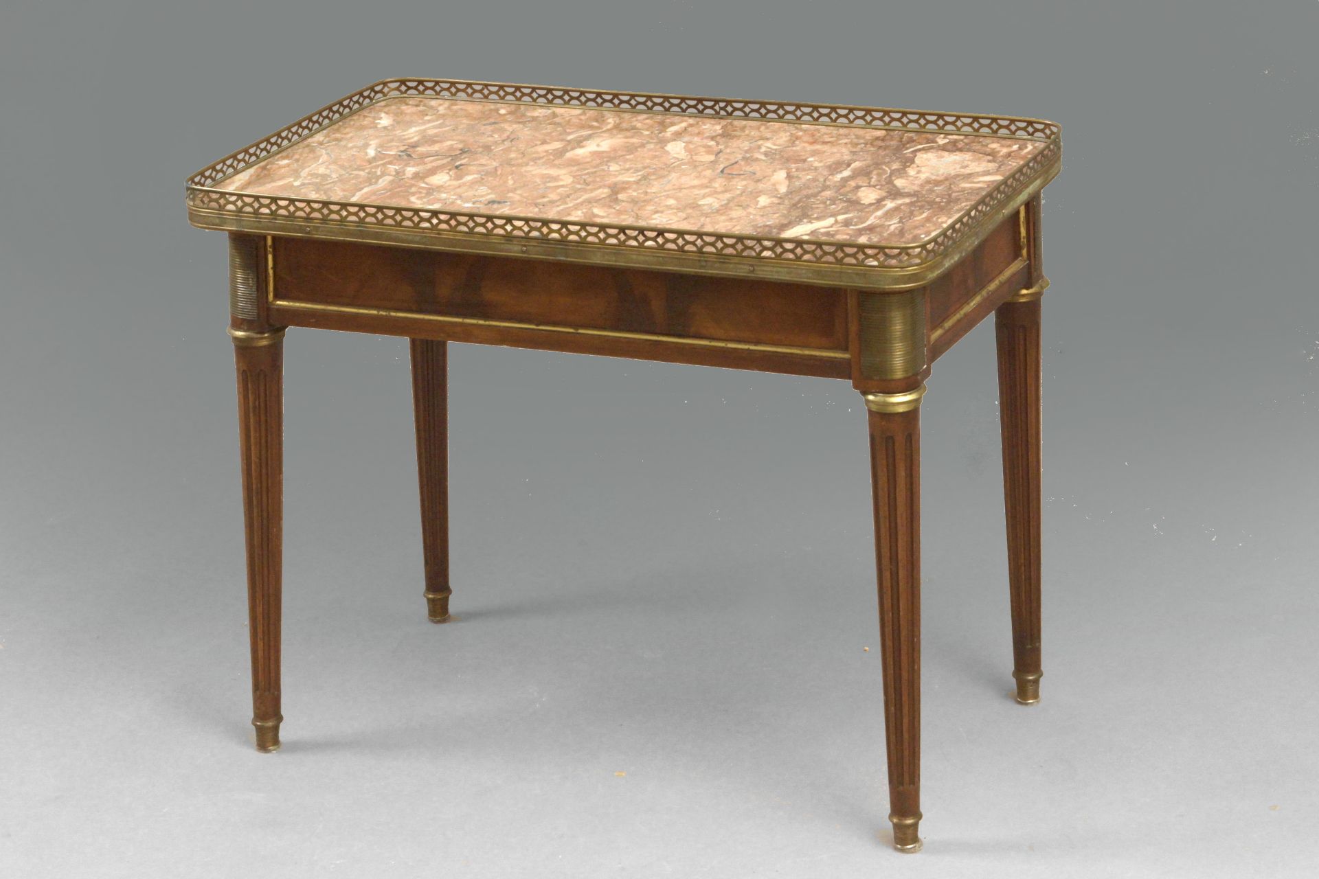 A Louis XVI style walnut side table circa 1900