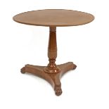 A 20th century mahogany pedestal table