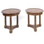 A pair of Empire style mahogany and bronze side tables
