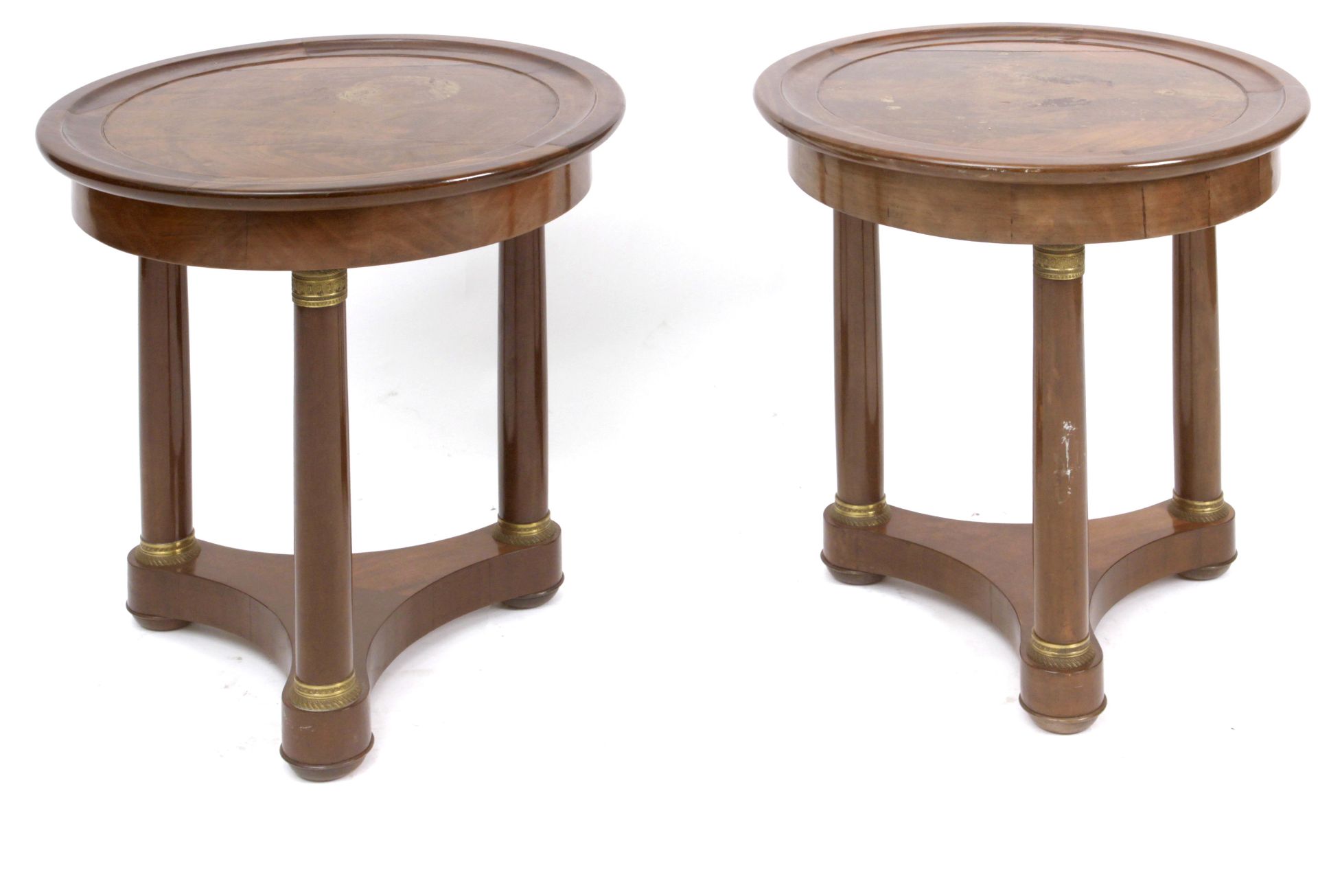 A pair of Empire style mahogany and bronze side tables