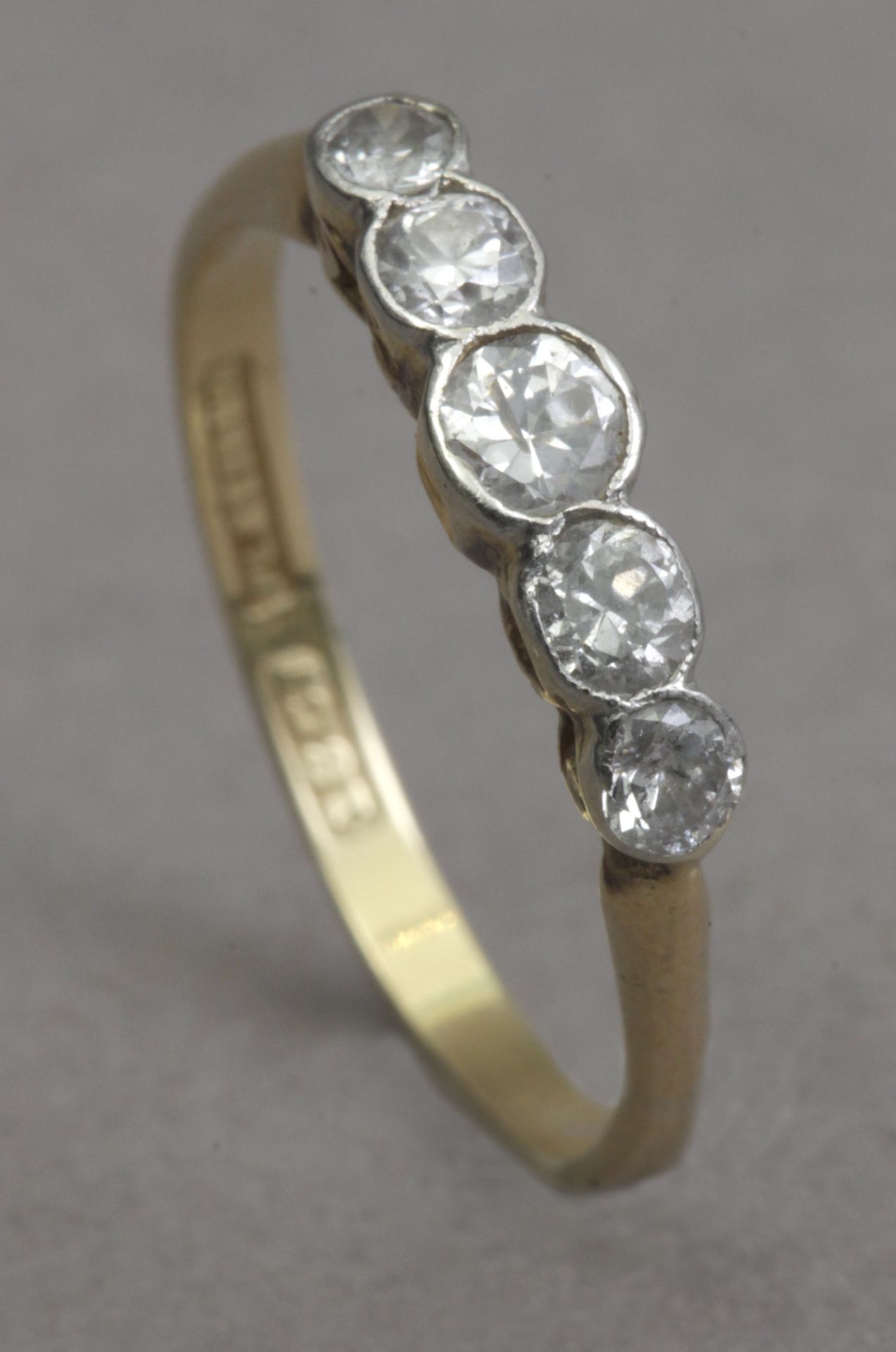 A first third of 20th century five stone diamond ring