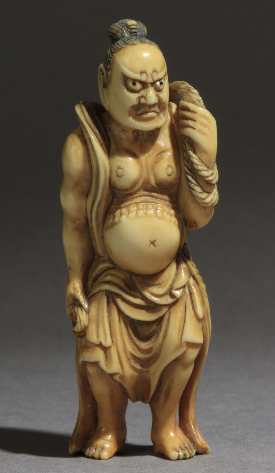 A mid 19th century Japanese netsuke from Edo period. Signed Tomochika