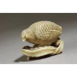 A 19th century Japanese netsuke. Signed Okatomo