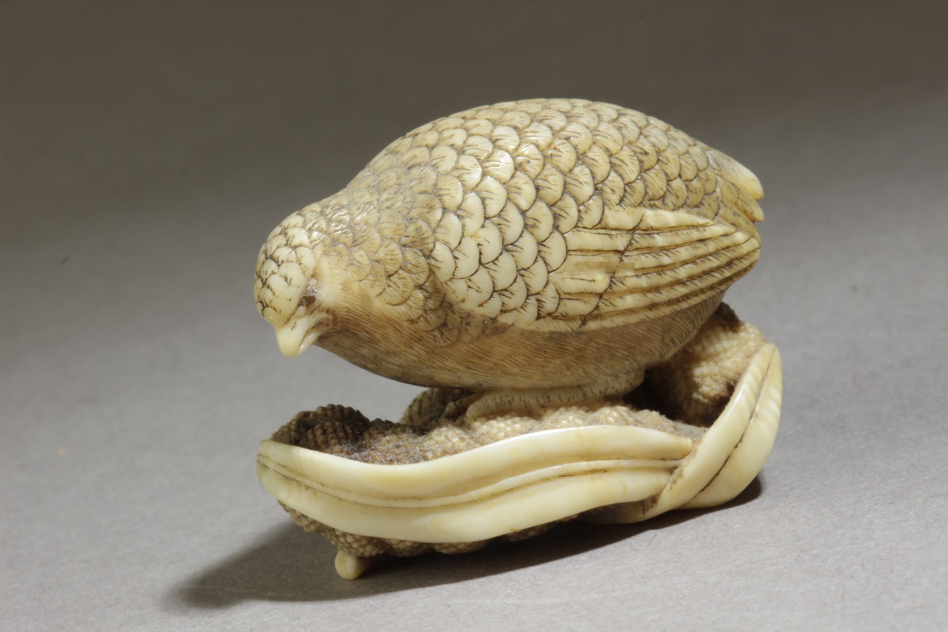 A 19th century Japanese netsuke. Signed Okatomo