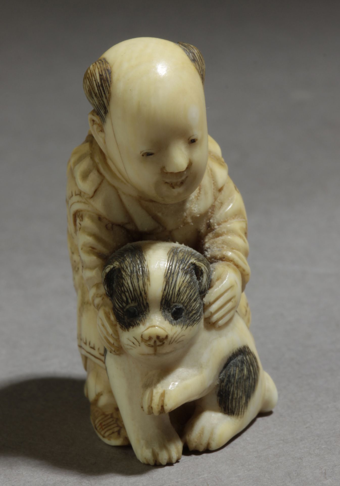 A mid 19th century Japanese netsuke. Signed Tomochika - Image 2 of 6