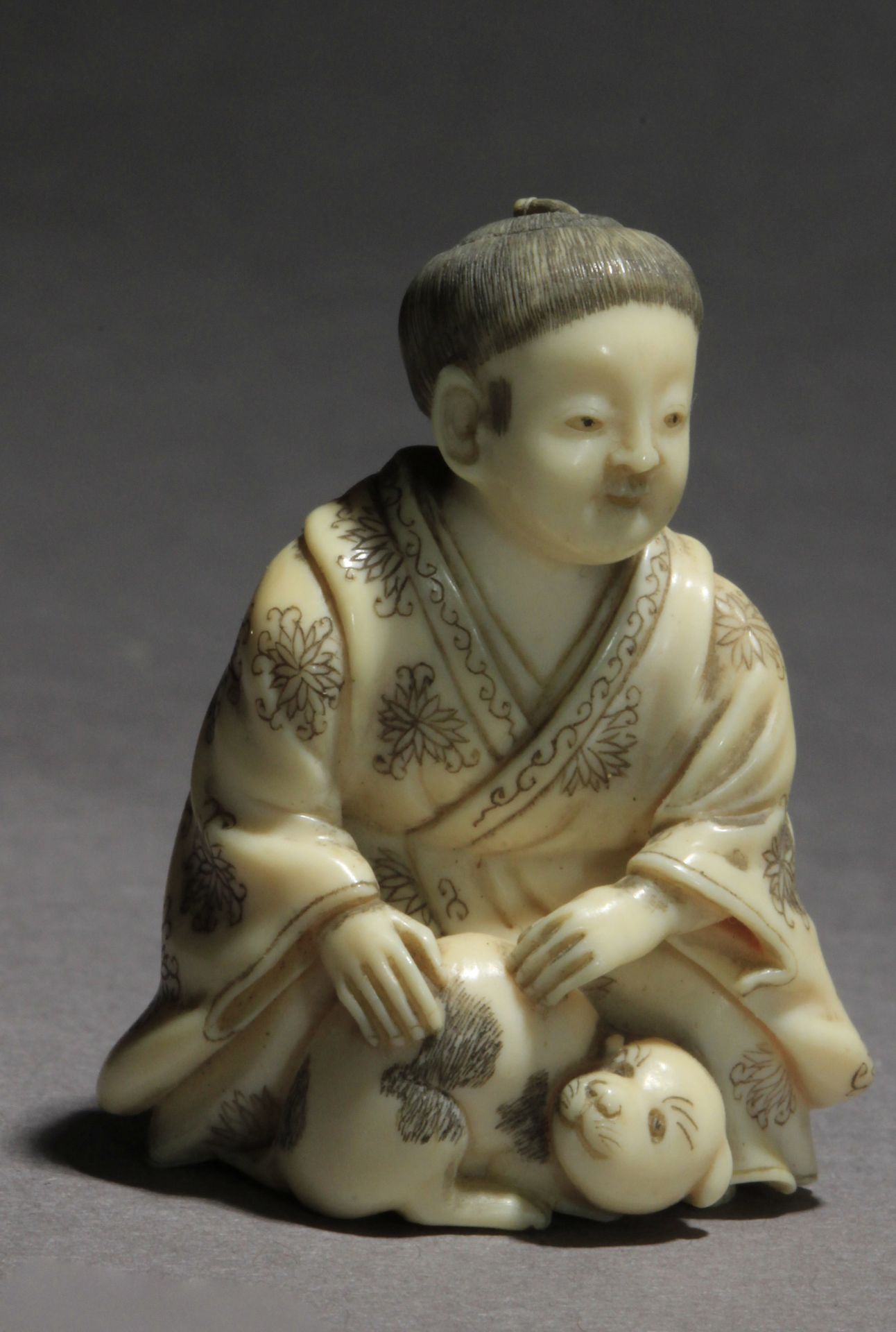 A mid 19th century Japanese netsuke from Meiji period. Signed Gyokomura