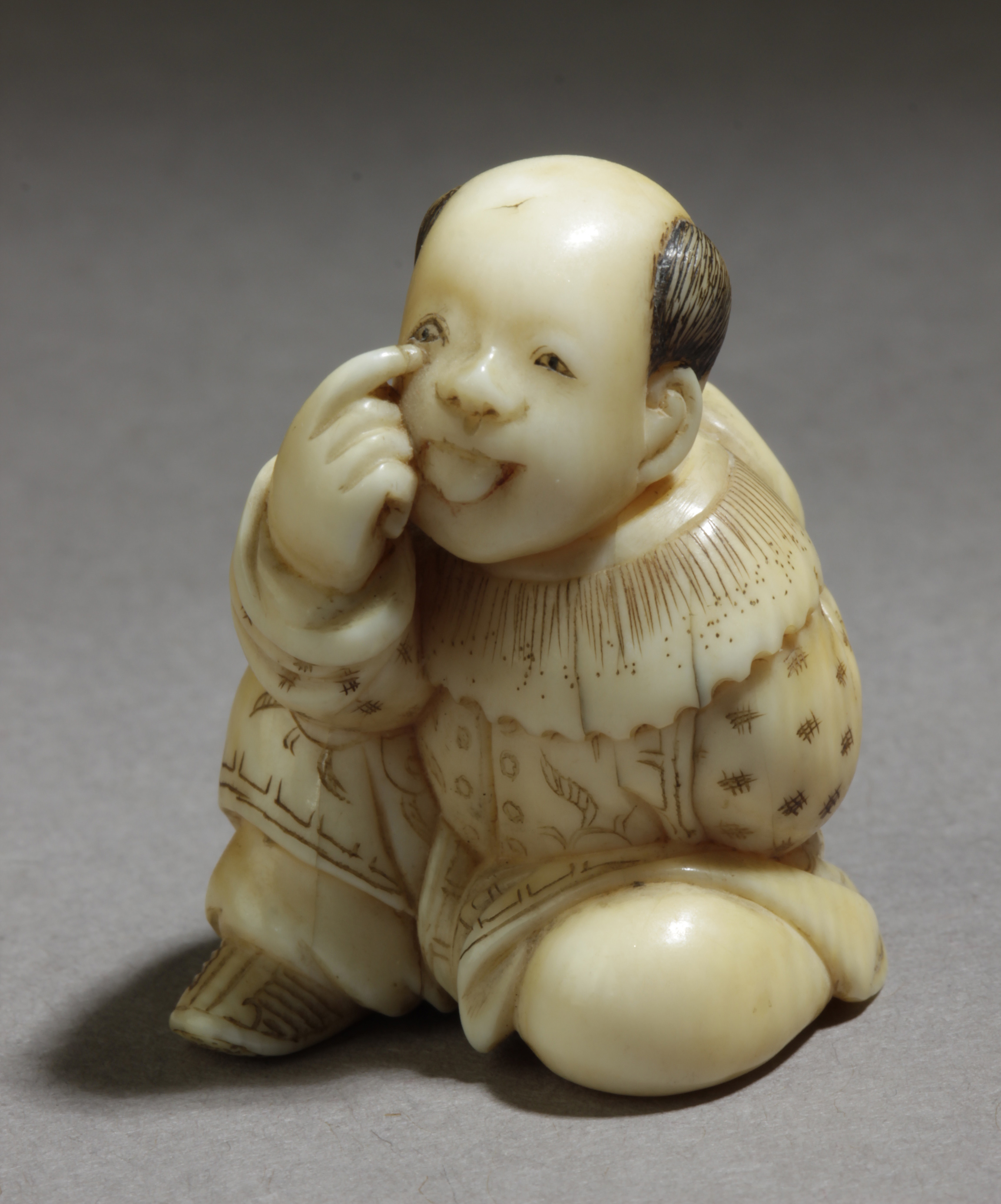 A mid 19th century Japanese netsuke from Edo period. Signed Okura