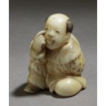 A mid 19th century Japanese netsuke from Edo period. Signed Okura