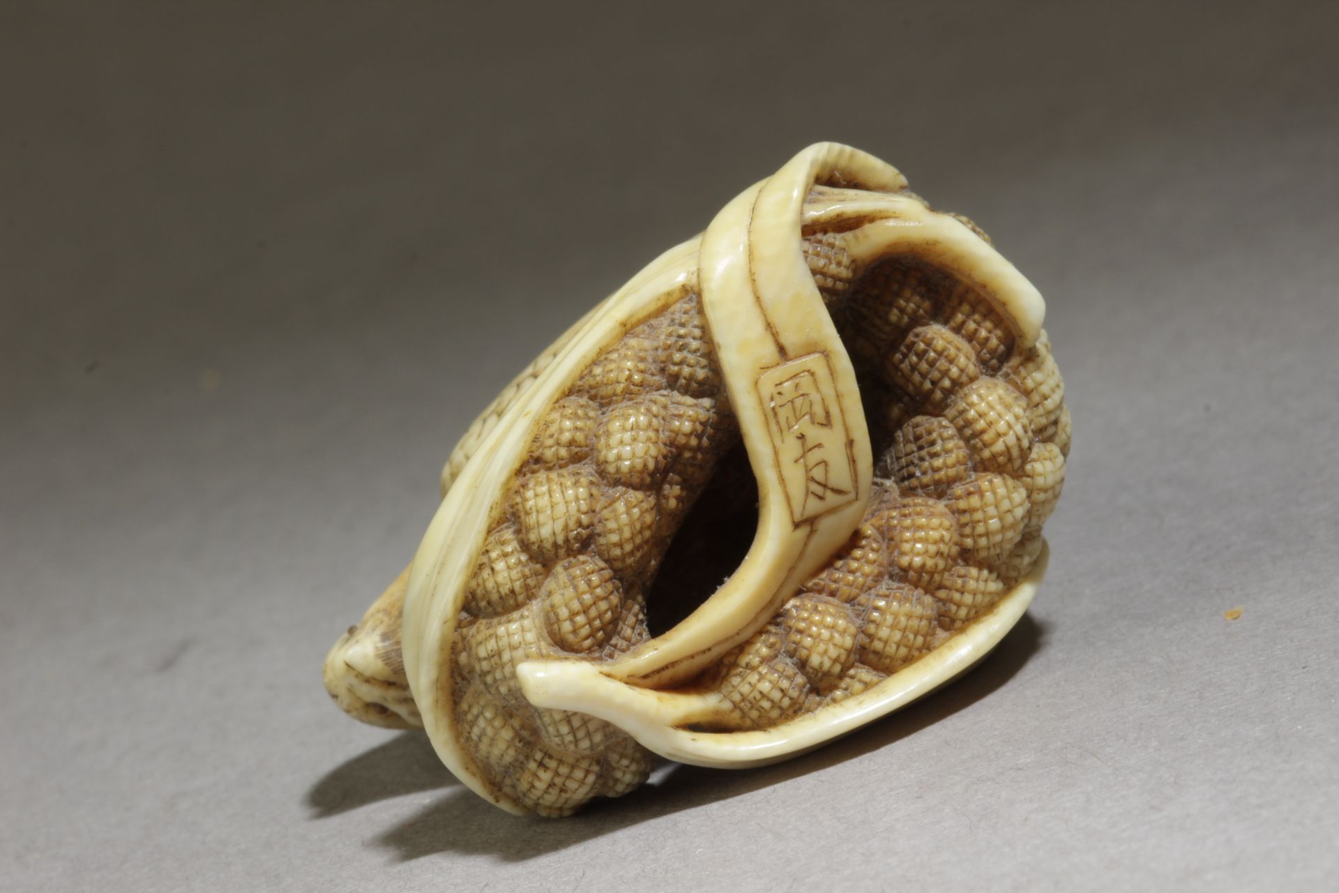 A 19th century Japanese netsuke. Signed Okatomo - Image 6 of 7