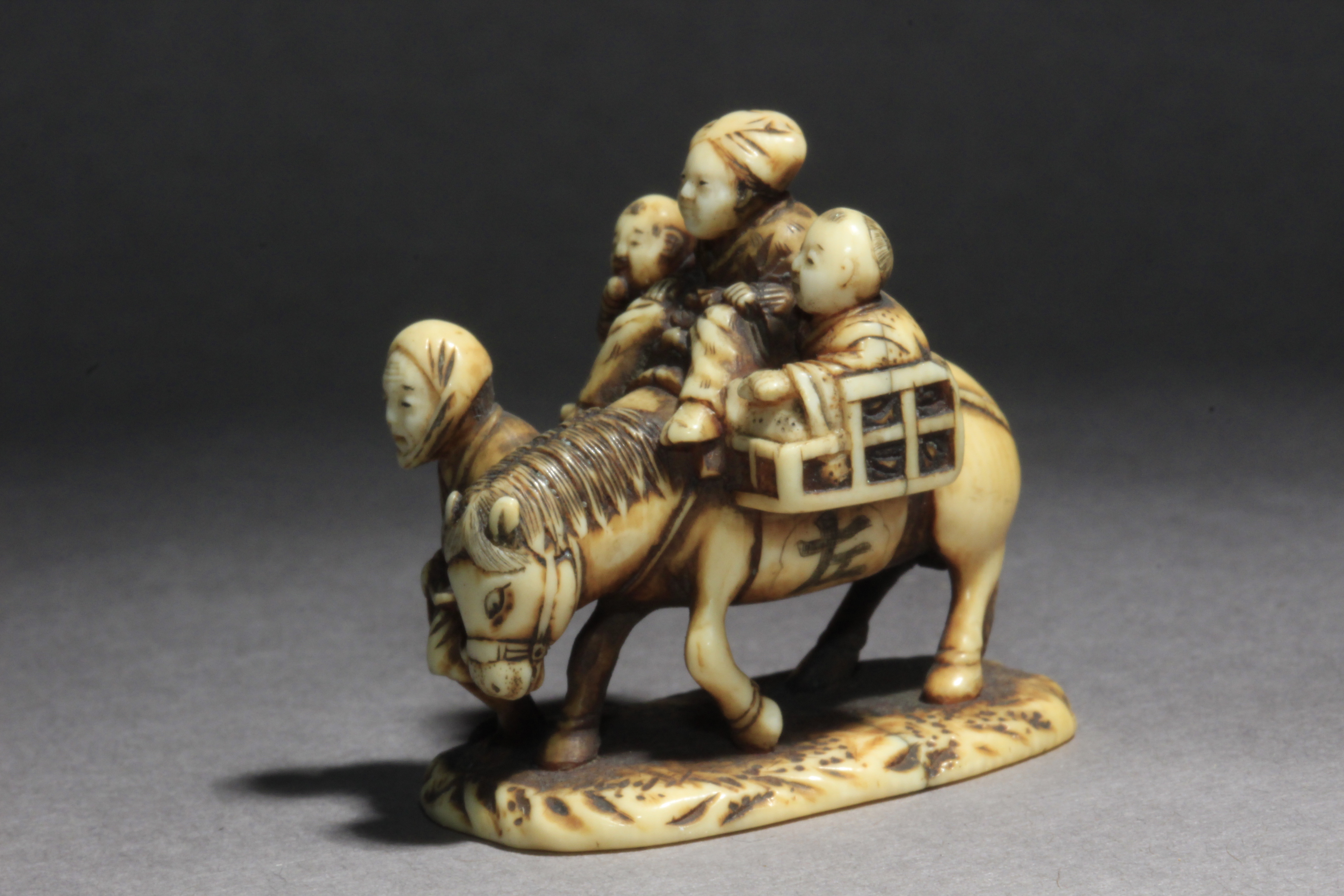 A 19th century Japanese netsuke-okimono. Signed Norishige