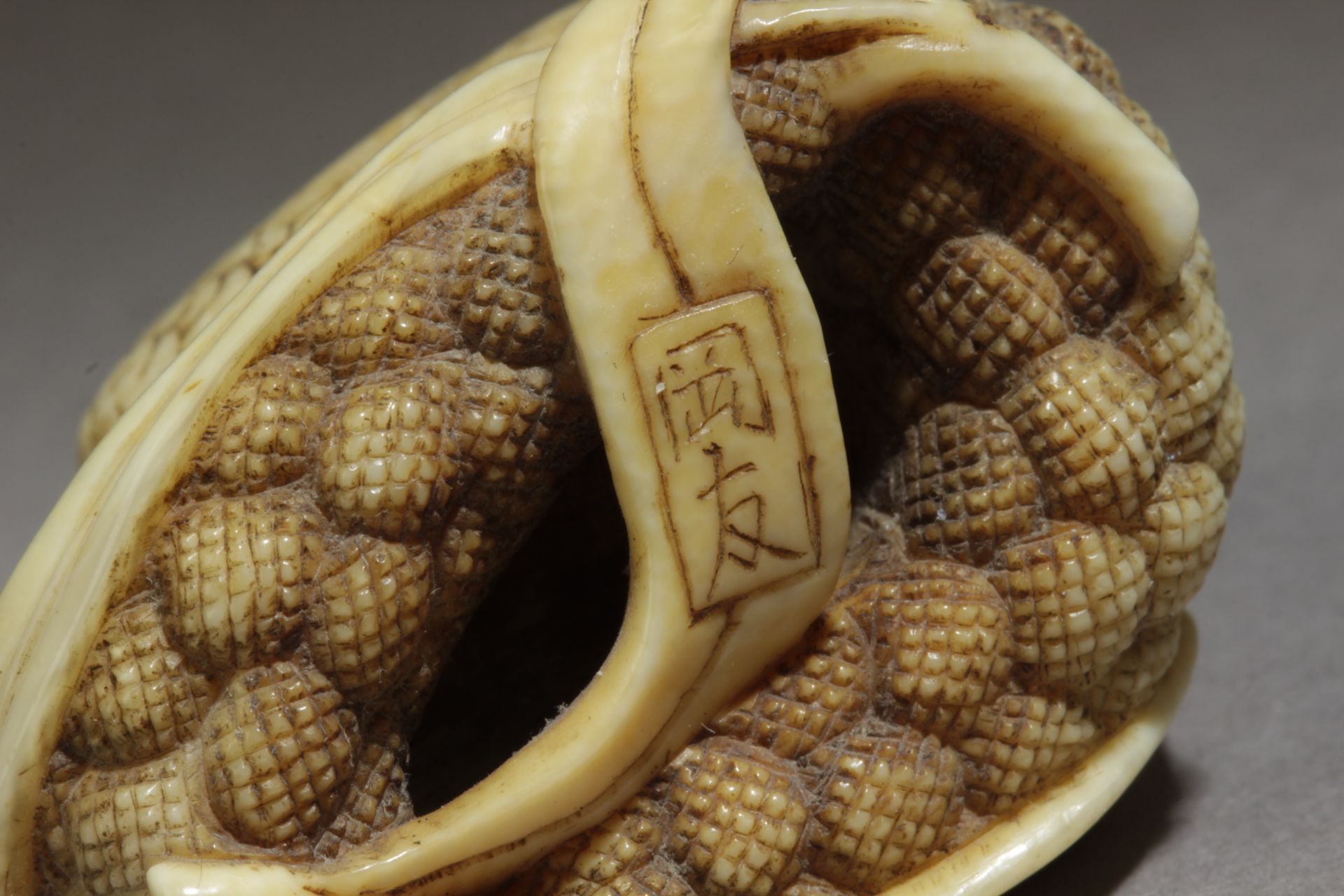 A 19th century Japanese netsuke. Signed Okatomo - Image 7 of 7