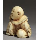 A mid 19th century Japanese netsuke from Edo period. Signed Hogyoko