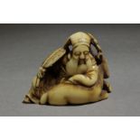 A 19th century Japanese netsuke from Edo period. Signed Tomochika