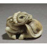 A 19th century Japanese netsuke. Signed Tomozan