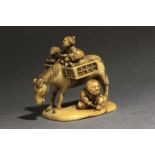 A 19th century Japanese netsuke-okimono from Edo period. Signed Gyokumin