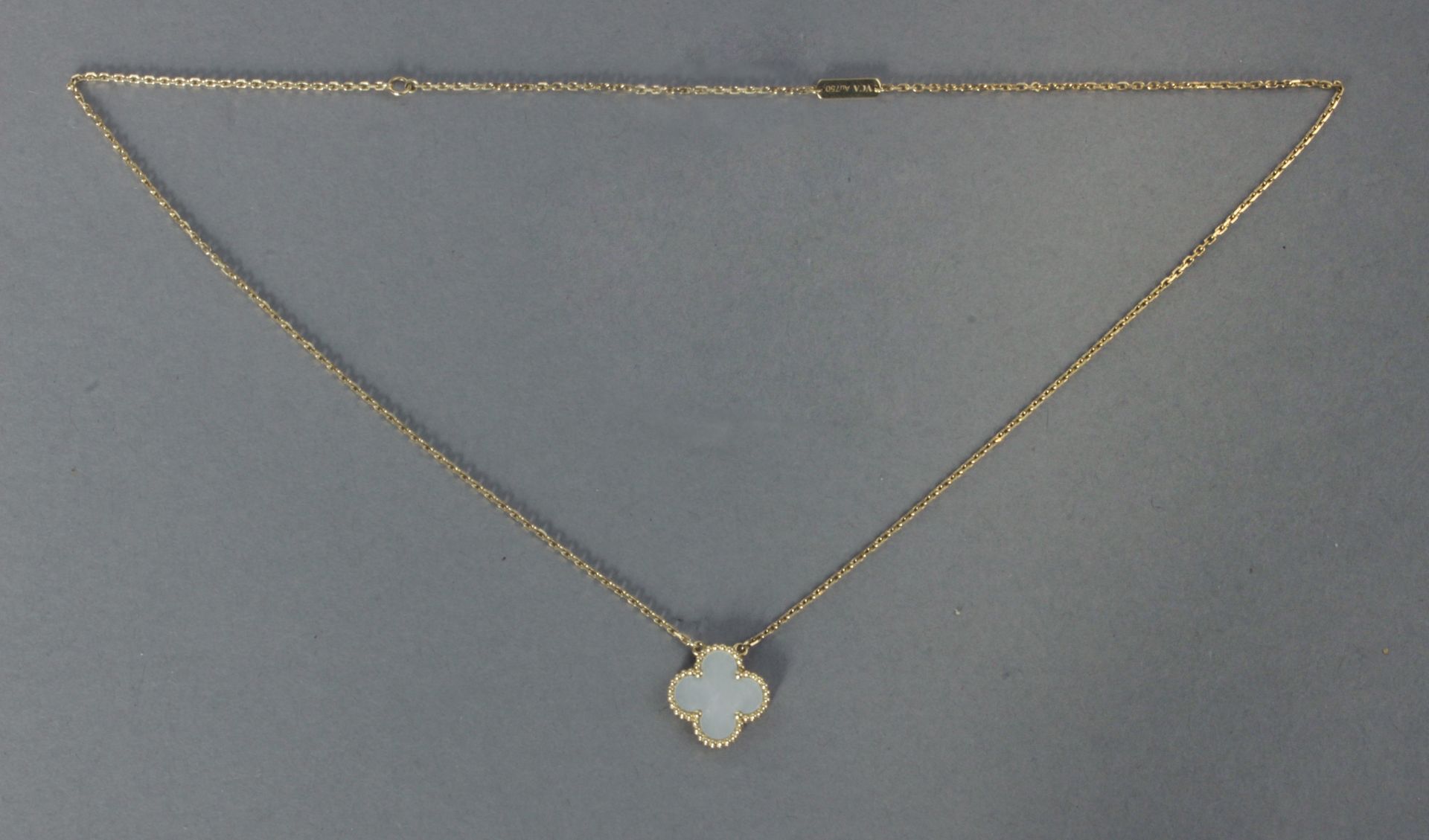 Van Cleef & Arpels. Alhambra pendant and chain