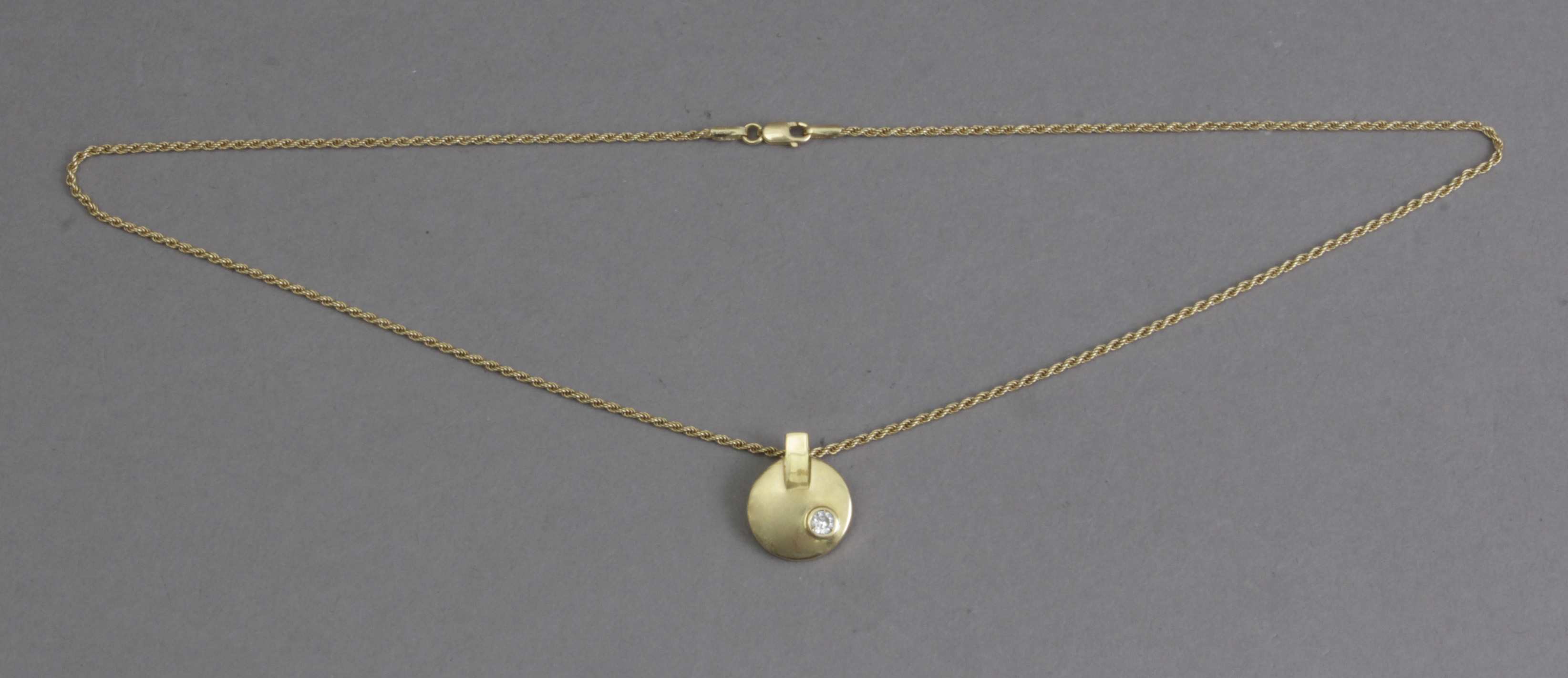 A diamond and gold pendant and chain - Image 3 of 4