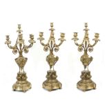 A set of three 19th-20th centuries bronze candlesticks