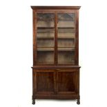 A Fernandino period mahogany library cabinet circa 1830