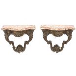A first half of 20th century pair of Louis XV style corbels