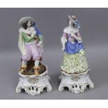 A pair of 19th century Isabelino porcelain figures