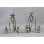A pair of 19th century silver four light candlesticks