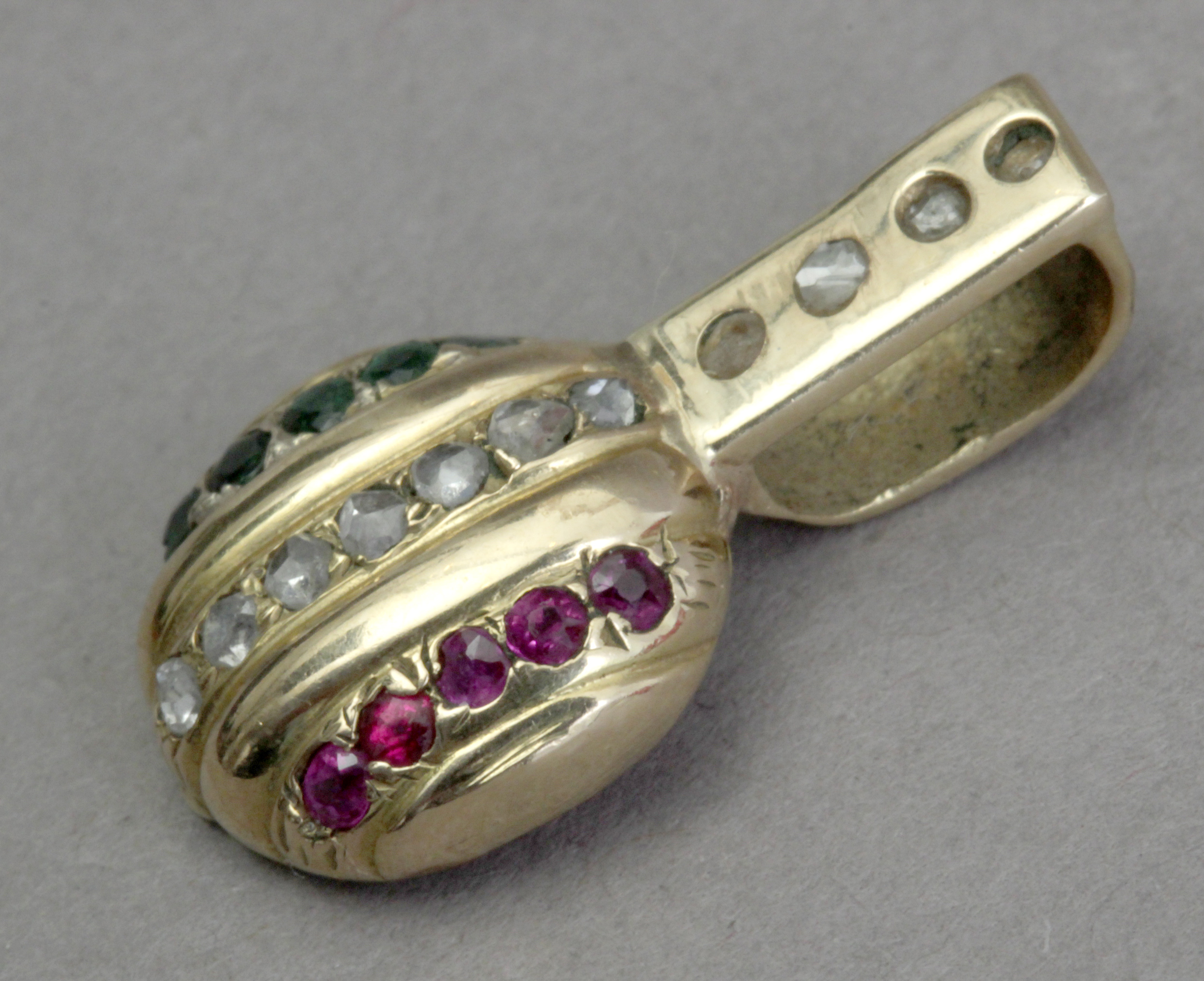 A rubies, emerald,and sapphire pendant with an 18k. yellow gold setting - Image 2 of 5