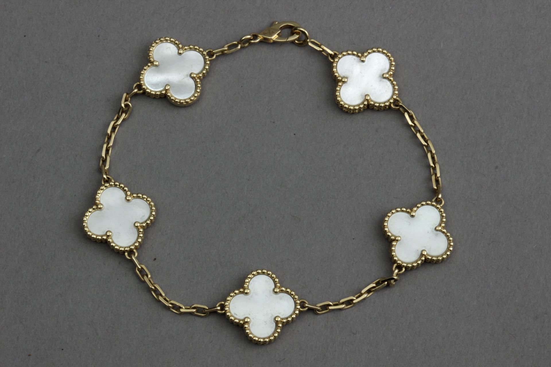 Van Cleef & Arpels. Alhambra bracelet.Mother of pearl and 18 k. yellow gold