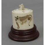 A 19th century Meiji essence jar in carved ivory
