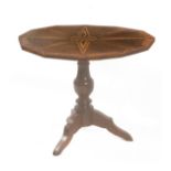 A 19th century Charles IV style mahogany till-top table