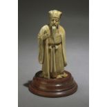 A Chinese ivory sculpture of a wiseman circa 1900