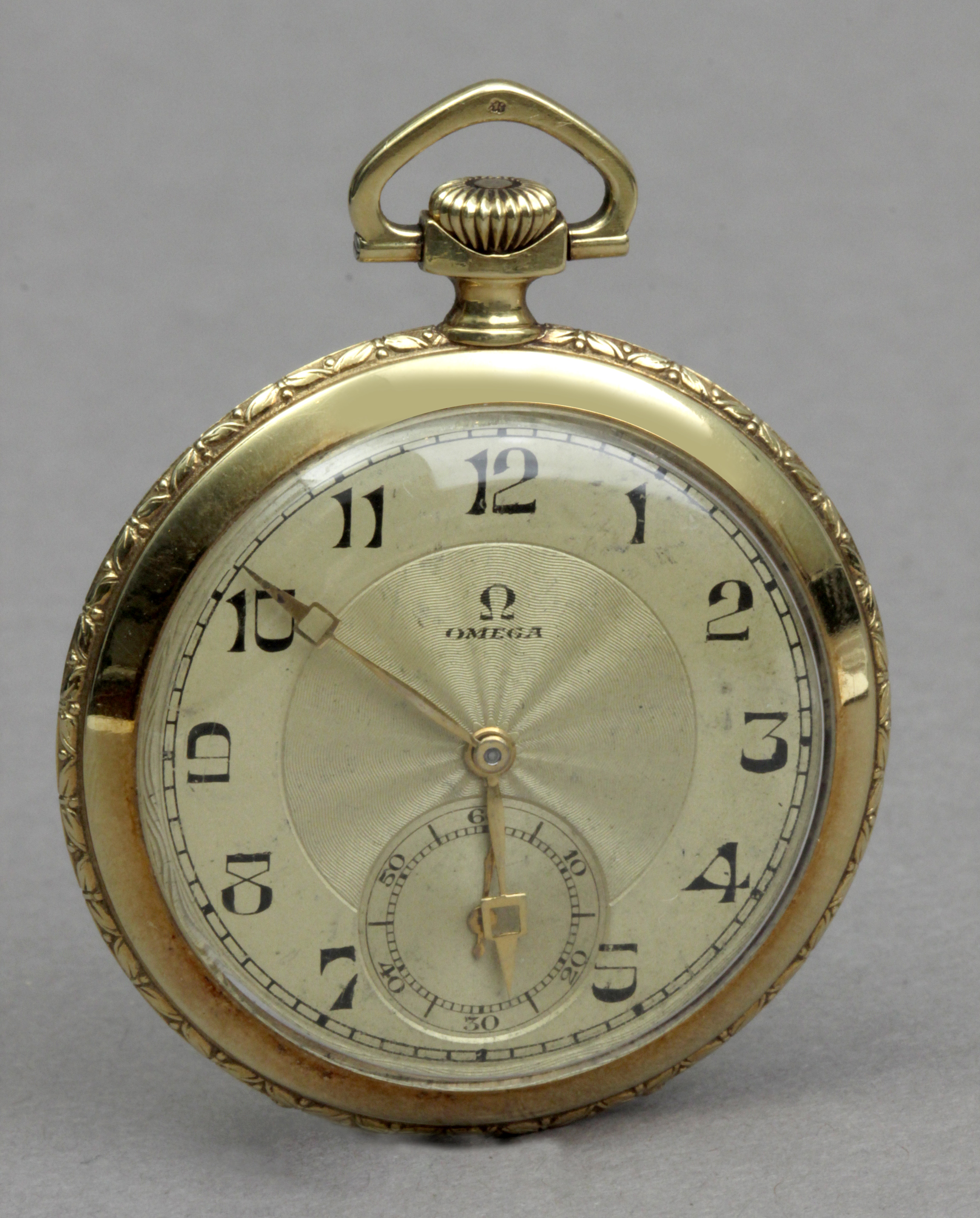 Omega. An 18k. yellow gold open face pocket watch