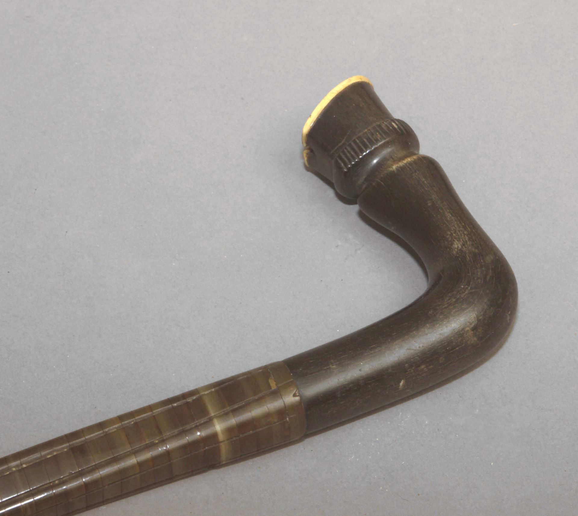 A 20th century wood, horn and antler sample walking cane.