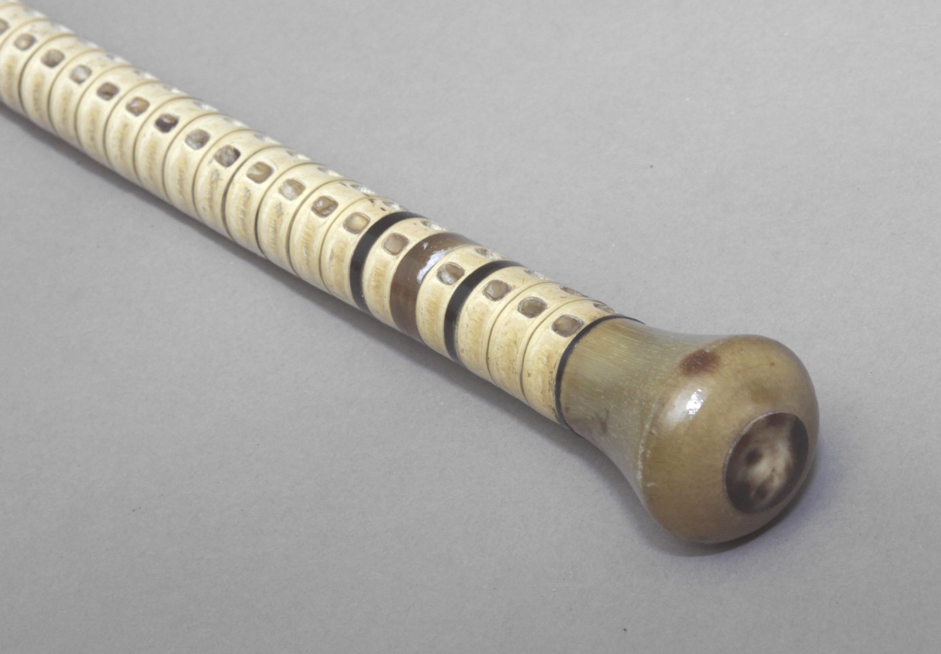 An early 20th century marine knob handled cane.