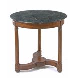 A French Empire style walnut guéridon table with a black marmol top