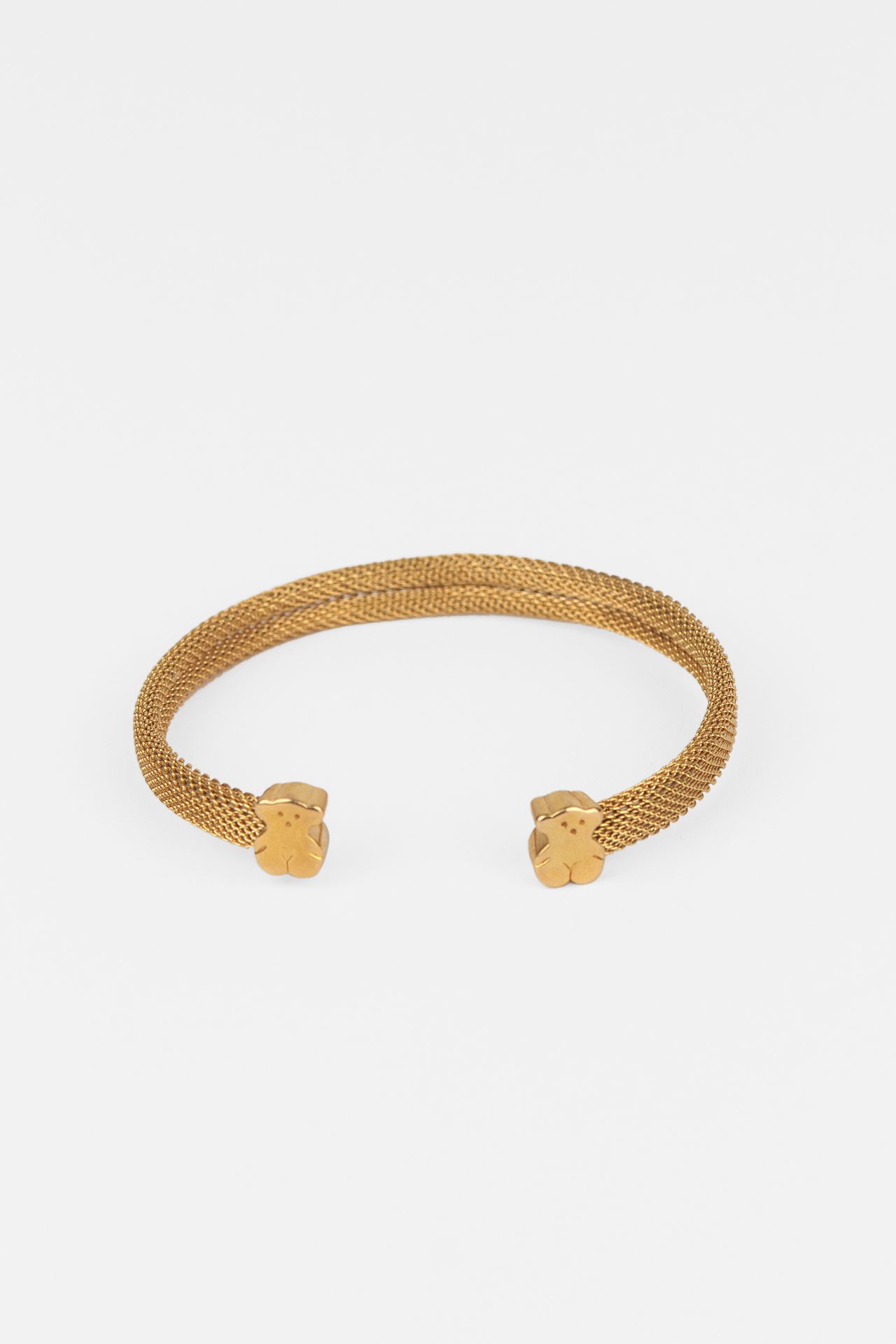 Tous. Mesh. An 18k. yellow gold bangle