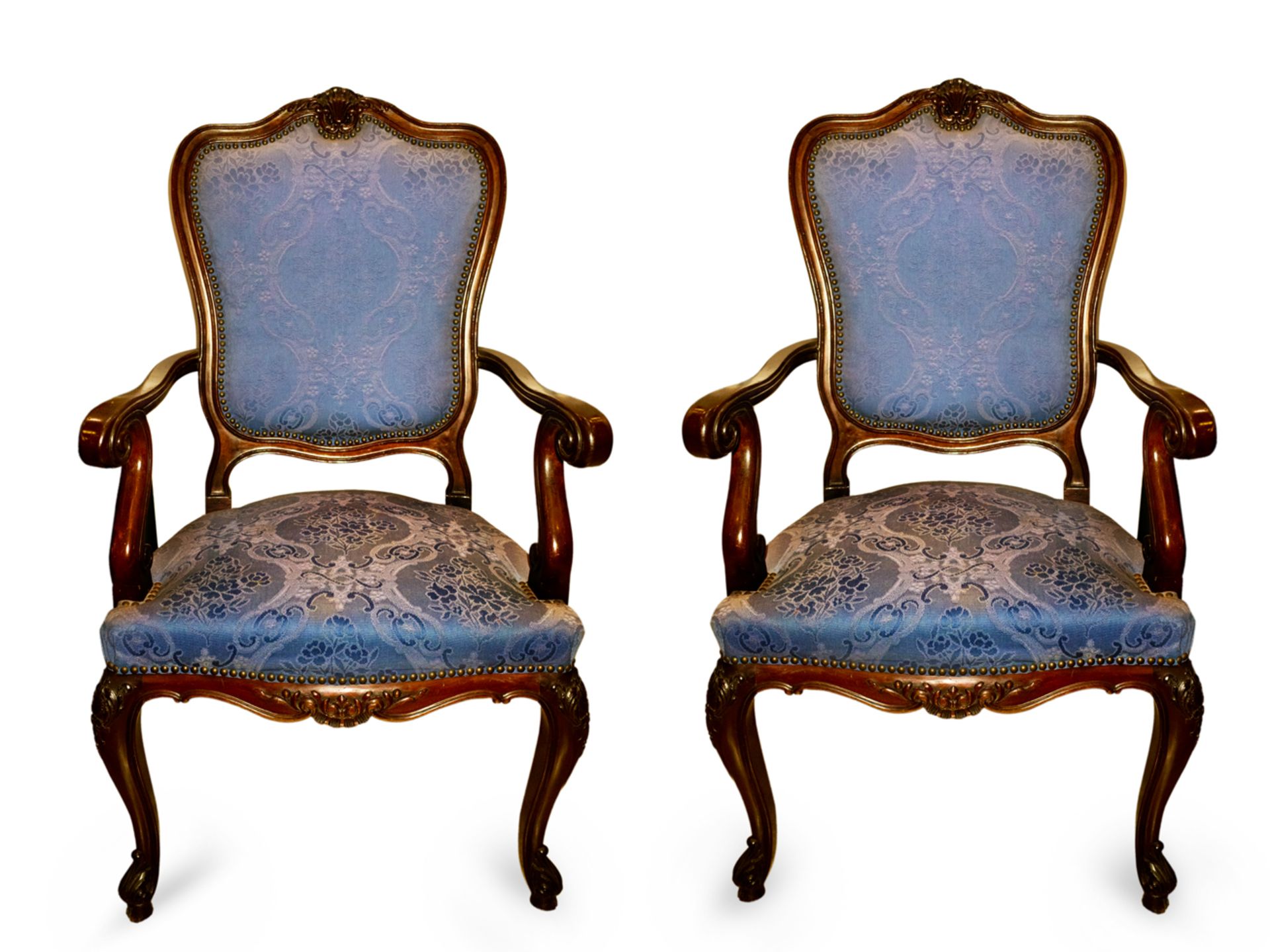 A pair of 20th century Louis XV style mahogany armchairs