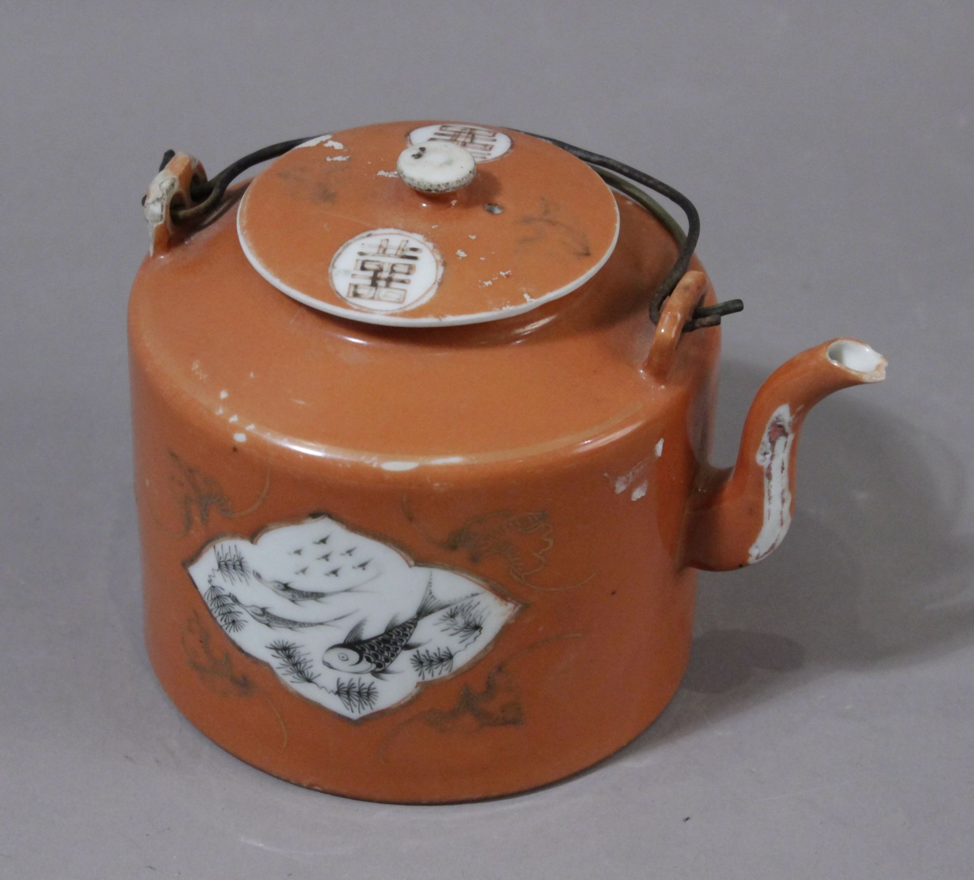 An early 20th century Chinese teapot in Famille Rose porcelain