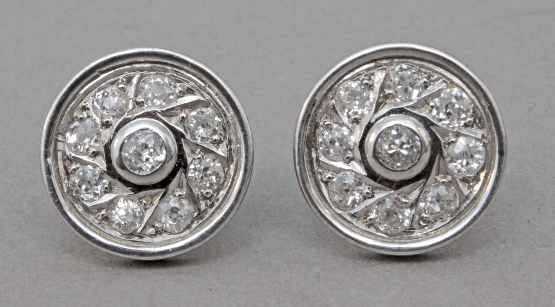 A pair of old mine and old European cut diamonds cluster earrings