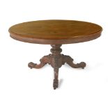 A 19th century English walnut folding table