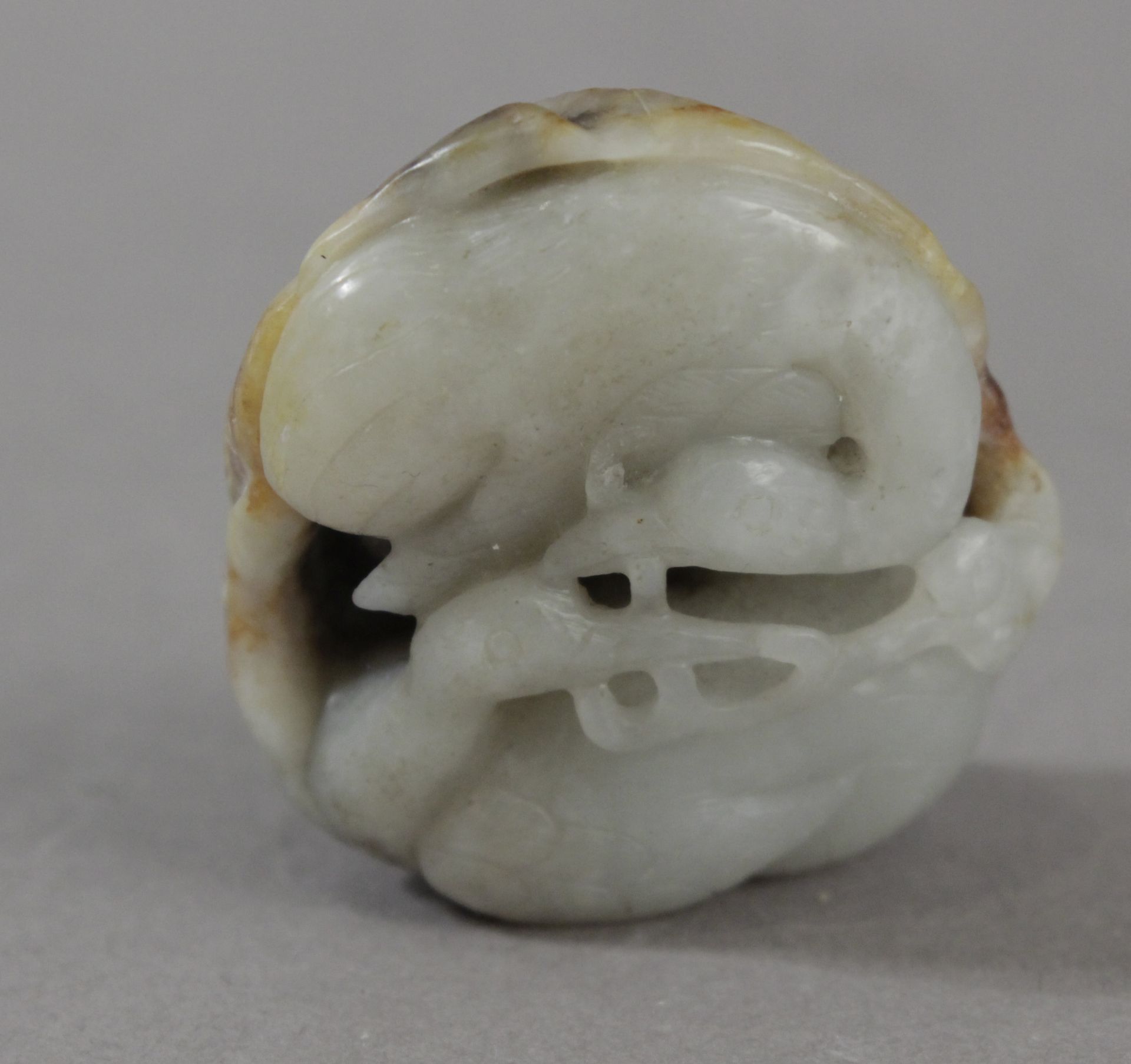 An early 20th century carved jade amulet from Qing period