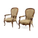 A pair of 19th century Victorian mahogany armchairs