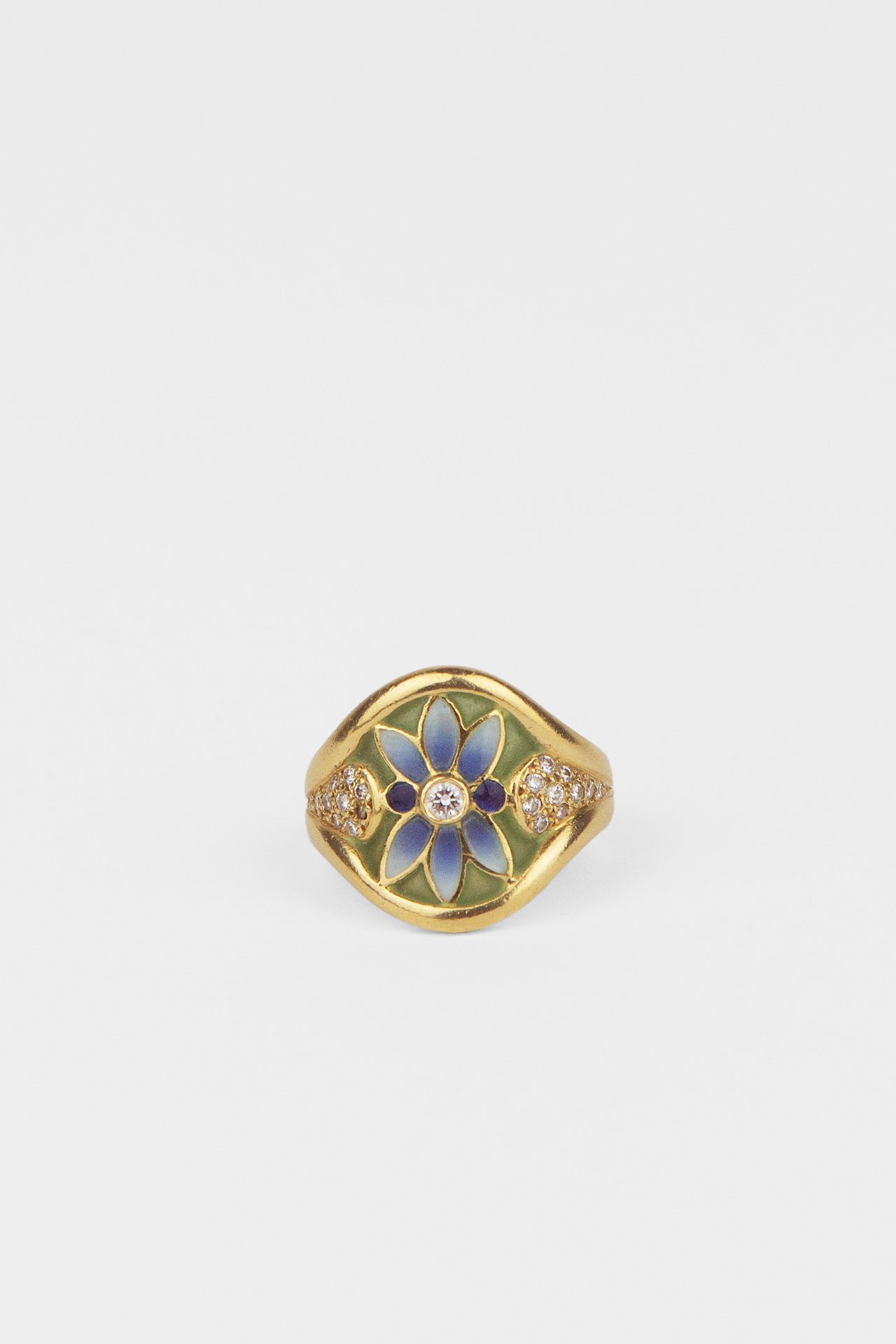 A modernist style rign with diamonds and plique-à-jour enamel