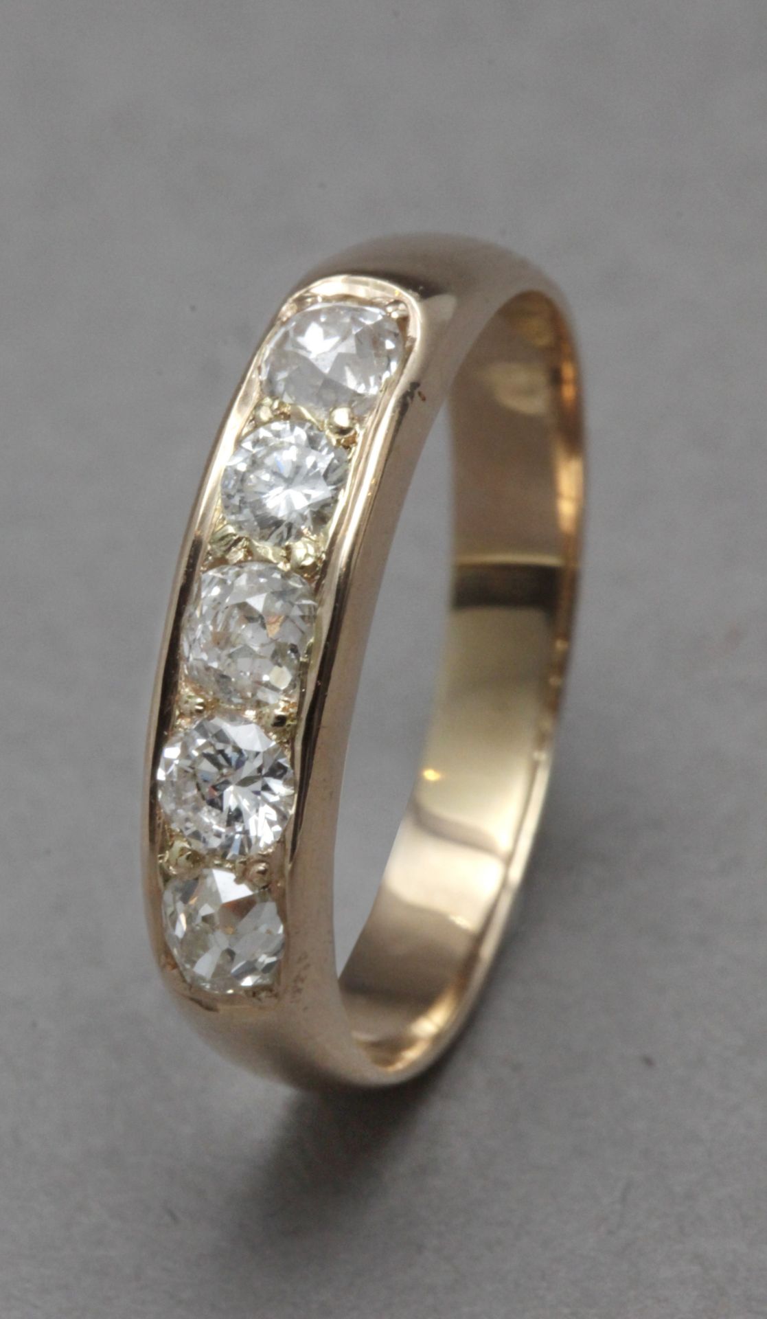 An old cut diamonds half eternity ring