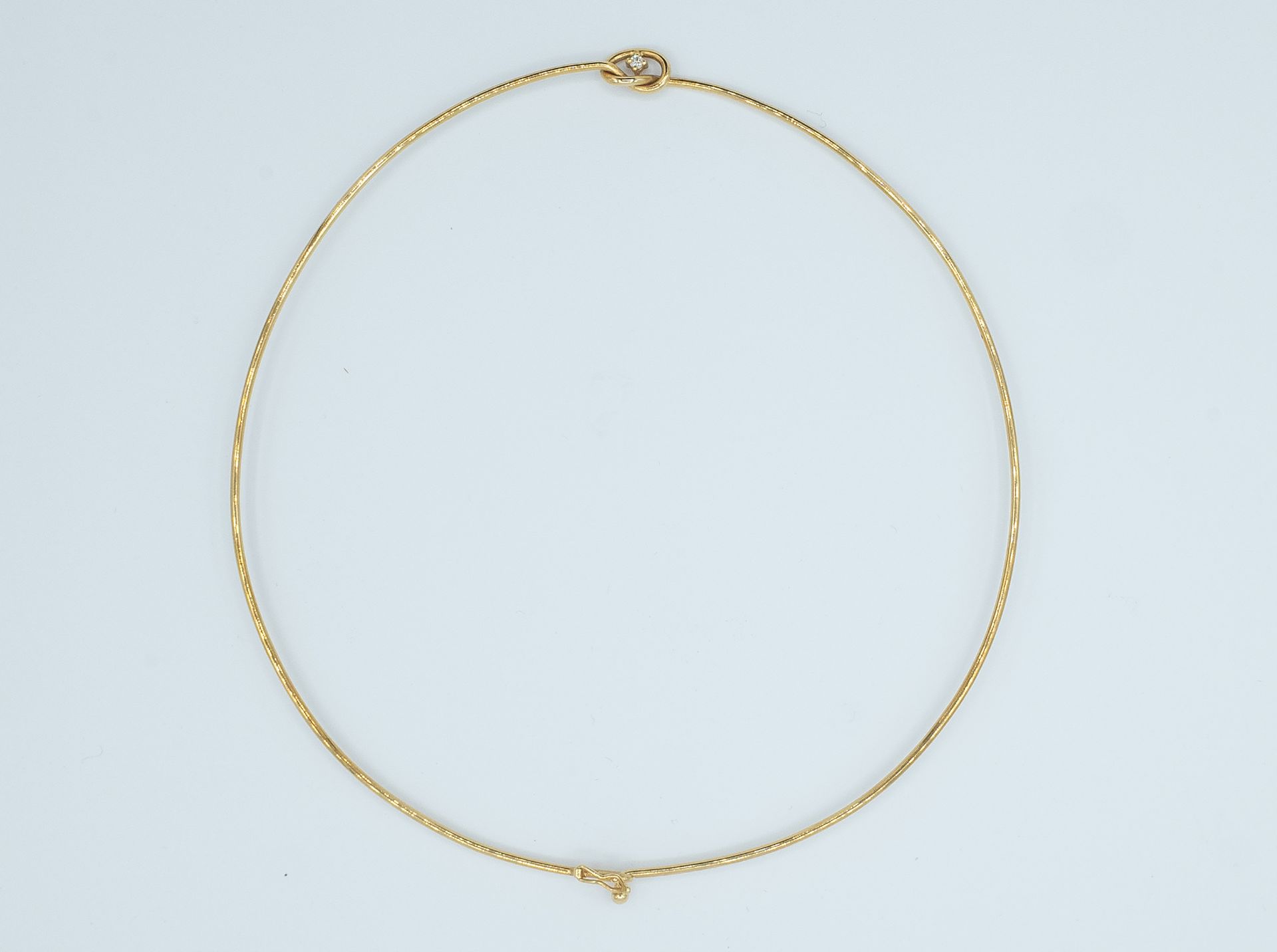 An 18k. yellow gold necklace with a 0,05 ct. brilliant cut diamond