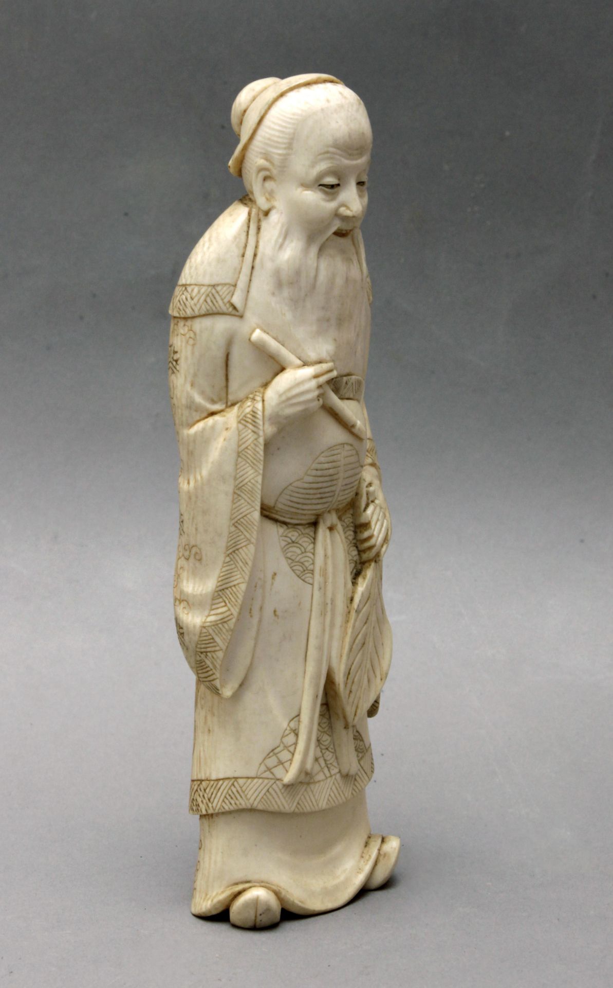 A first third of 20th century Japanese school carved ivory and bone Canton style opium pipe