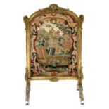 A 19th century Louis XVI style petit point fire screen