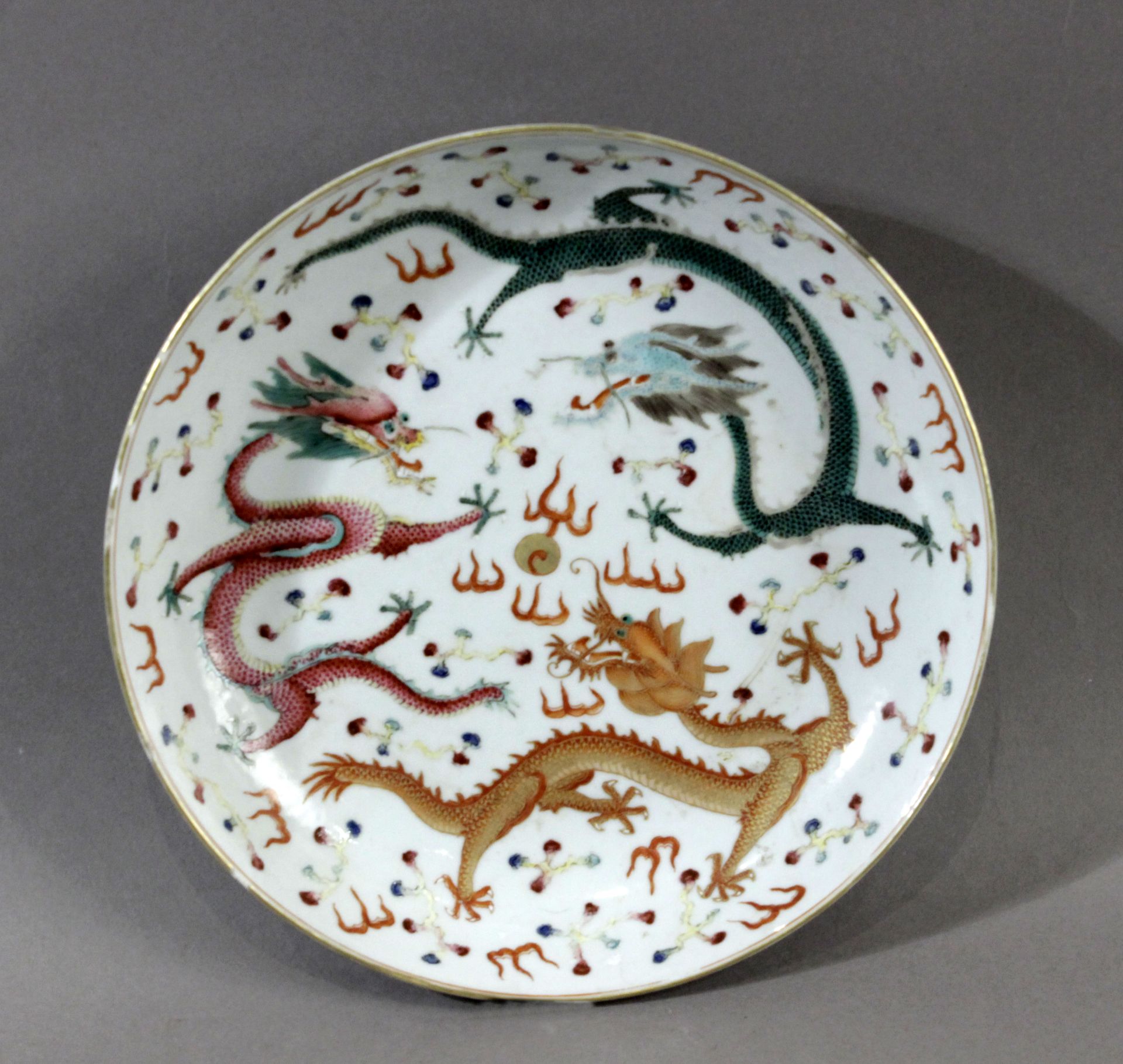 An early 20th century Chinese dish in polychromed porcelain