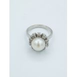 A pearl and diamonds cluster ring circa 1960