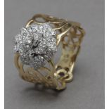 A diamonds cluster ring with an 18k. yelllow gold setting